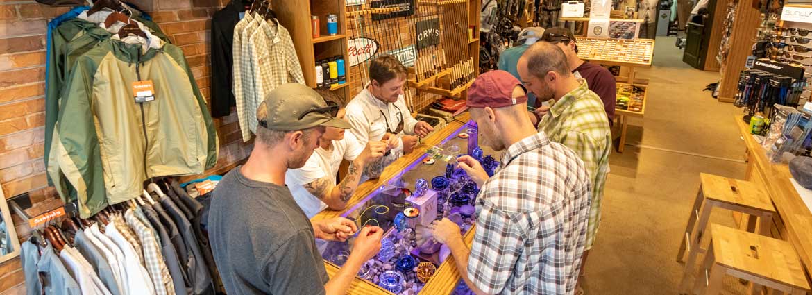 A group attending an Orvis 101 class at Fishwest in Sandy, UT