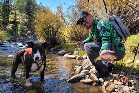 Fishwest E-Commerce Manager, JC Weeks shows off a beautiful cutthroat trout in the Utah high country.