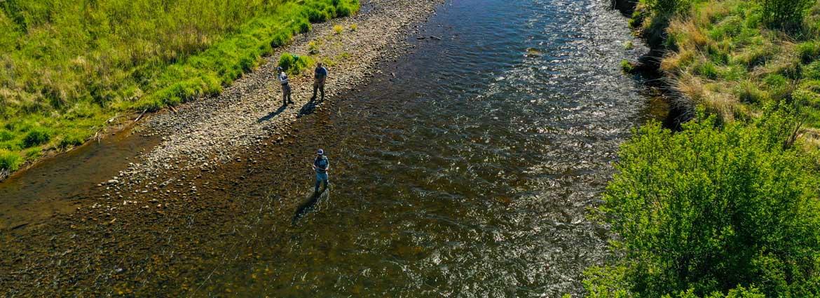 Jans fishing guides lead a group trip on a lake in Northern Utah