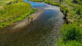 Jans fishing guides lead a group trip on a lake in Northern Utah