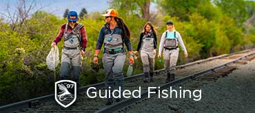 A group of anglers hiking out of Utah’s Provo river after a successful day on the water with the Fishwest Guide staff.